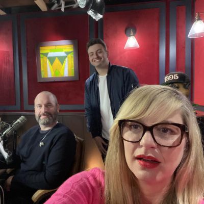 Tom Segura and Christina Pazsitzky took a picture in their Podcast studio with Josh Zollo.